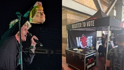 Billie Joe Armstrong, frontman of Green Day, holds up a Donald Trump mask with the word "Idiot" scrawled on the forehead. Fans tossed it to him during the rock band's opening "Savior Tour" show at Nationals Park in Washington, D.C. The group also set up a "register to vote" booth at the venue. (Pictures taken from X) Billie Joe Armstrong, frontman of Green Day, holds up a Donald Trump mask with the word "Idiot" scrawled on the forehead. Fans tossed it to him during the rock band's opening "Savior Tour" show at Nationals Park in Washington, D.C. The group also set up a "register to vote" booth at the venue. (Pictures taken from X)