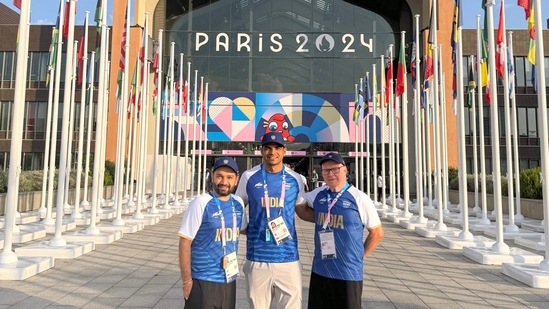 Neeraj Chopra poses for a photo with his coach, Klaus Bartonietz, as he arrives at the Olympic Games Village to defend his gold medal in Paris. (Neeraj Chopra - X)
