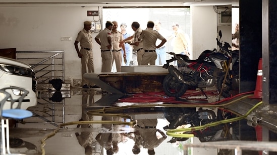  Delhi Police officers and MCD officials investigate Rau's IAS Study circle Spot at Old Rajinder Nagar area, after three civil services aspirants died at a coaching centre due to drowning.(Arvind Yadav/ Hindustan Times)