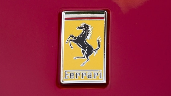 The Ferrari logo is seen on a Ferrari car in front of the New York Stock Exchange.(Reuters)