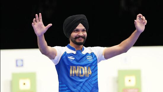 India’s Sarabjot Singh celebrates after winning the Olympic 10m air pistol mixed team bronze medal partnering Manu Bhaker at the Chateauroux Shooting Centre on Tuesday. (REUTERS)
