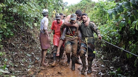 Indian army personnel during a rescue operation after a devastating landslide hit hilly villages triggered by heavy rainfall, in Wayanad on Tuesday. (ANI)