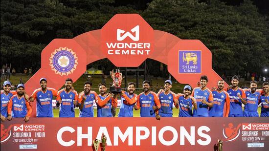 Indian players pose with the trophy after winning the 3-match T20I series over Sri Lanka in Pallekele on Tuesday. (PTI)