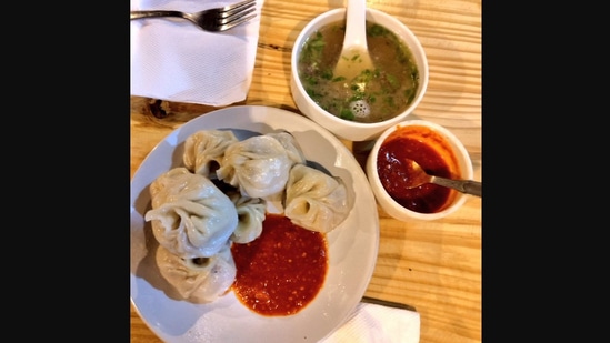 A woman shared this image of a plate of momos she clicked at a restaurant. (X/@Keertizzz)