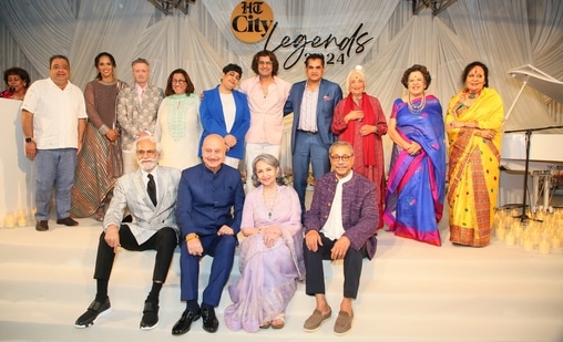 Cutting a truly legendary figure, winners of HT City Legends 2024 Awards (clockwise from left): Chef Manish Mehrotra, badminton player Saina Nehwal, designer Rohit Bal, philanthropist Kiran Nadar, special needs educator Tamana Chona, singer Sonu Nigam, Bureaucrat-G20 Sherpa Amitabh Kant, artist Anjolie Ela Menon, special needs educator Shayama Chona, Bharatanatyam and Odissi guru Sonal Mansingh, cardiologist Dr Naresh Trehan, actor Sharmila Tagore, actor Anupam Kher and FDCI chairperson Sunil Sethi(Photo: Manoj Varma/HT)