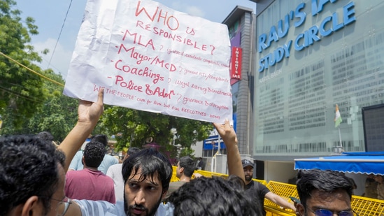 A student during a protest after three civil services aspirants died due to drowning at a coaching centre in Old Rajinder Nagar area, in New Delhi, Monday, July 29, 2024. (PTI Photo/Shahbaz Khan)(PTI07_29_2024_000199B)(PTI)