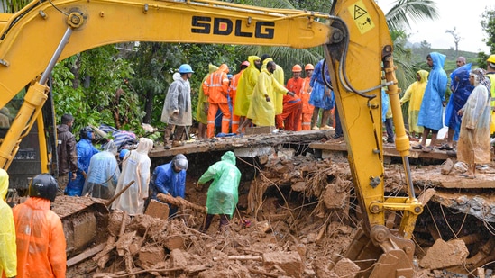 Rescue work is underway following landslides triggered by heavy rains at Chooralmala in Wayanad district, Kerala.(PTI)