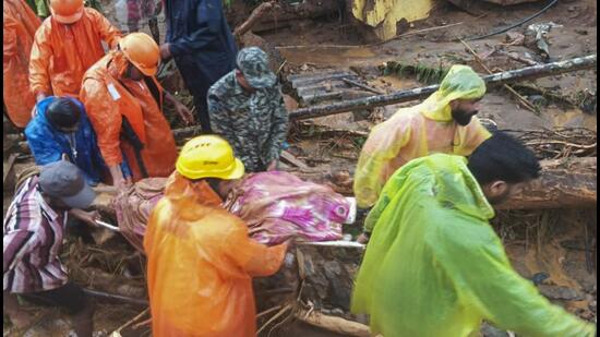 Rescuers in Wayanad district. (PTI)