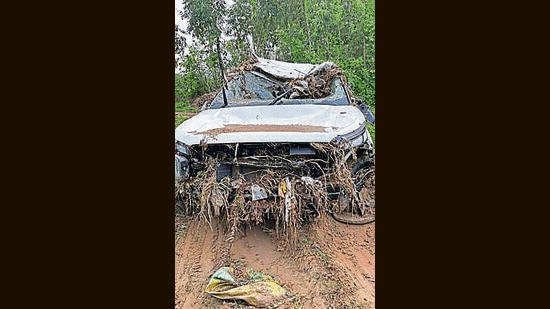 The car was spotted by Tanda village residents which eventually led to the discovery of the man’s body on Tuesday evening. (HT Photo)