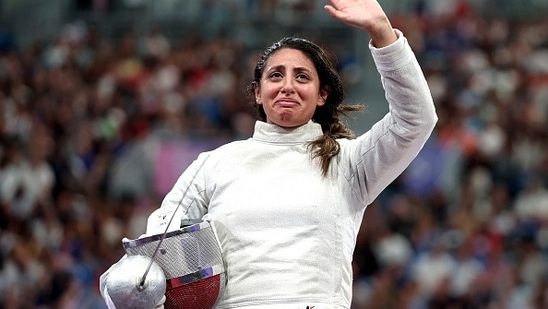 https://www.mobilemasala.com/sports/Egyptian-fencer-competes-in-Paris-Olympics-2024-while-being-7-months-pregnant-i285632