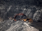 A loader loads coal in the truck at an open cast coal field at Topa coal mine in the Ramgarh district in the eastern Indian state of Jharkhand, India, February 27, 2024. (Amit Dave/Reuters)
