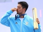 Gold medallist Jose Torres Gil of Argentina celebrates with his medal
