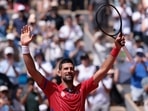Novak Djokovic of Serbia celebrates after winning his match against Dominik Koepfer of Germany