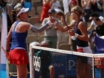 Anna Karolina Schmiedlova of Slovakia and Barbora Krejcikova of Czech Republic shake hands after their match