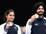 Shooter Manu Bhaker and Sarabjot Singh pose for a photograph with their Bronze medals on winning the 10m Air Pistol Mixed Team event at the Olympic Games Paris 2024, in Paris on Tuesday.