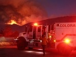 A firefighter works as the Nixon Fire burns with evacuation orders in the area on July 29, 2024 near Aguanga, California. The wildfire in Riverside County has scorched 3,700 acres thus far. 726,000 acres have burned in California so far this year- more than five times the average for this point in the summer. (Photo by MARIO TAMA / GETTY IMAGES NORTH AMERICA / Getty Images via AFP)