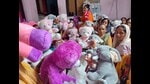 Women showing tailored soft toys. (HT) Women showing tailored soft toys. (HT)