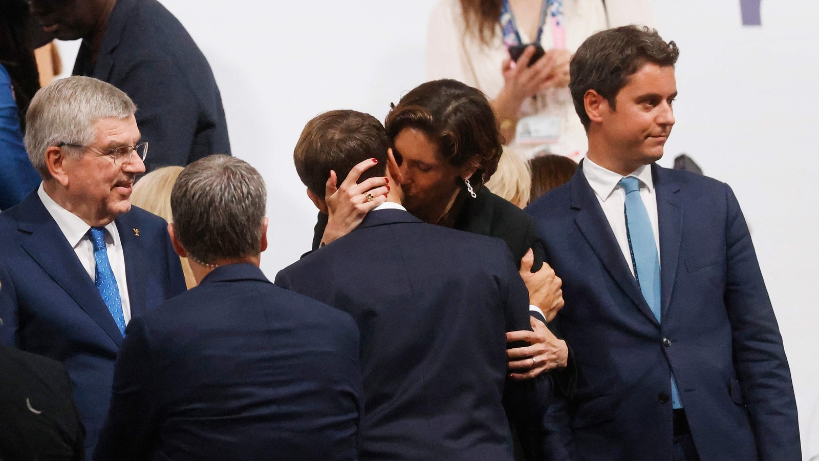 French President Emmanuel Macron’s intimate kiss with sports minister ...