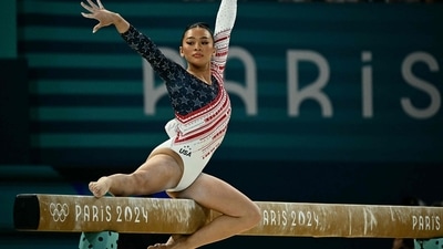 US' Sunisa Lee competes in the balance beam event of the artistic gymnastics women's team final during the Paris 2024 Olympic Games (AFP)