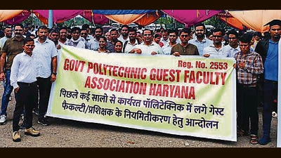 Lecturers during the protest in Panchkula on Wednesday. (HT Photo)