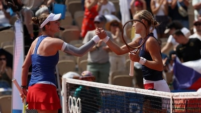 Anna Karolina Schmiedlova of Slovakia and Barbora Krejcikova of Czech Republic shake hands after their match (REUTERS)