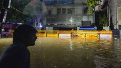 The road in front of Rau’s IAS Study Circle was again completely flooded on Wednesday. (PTI) The road in front of Rau’s IAS Study Circle was again completely flooded on Wednesday. (PTI)