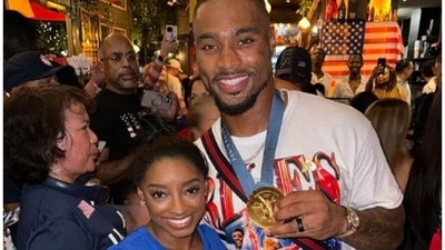 Jonathan Owens, the husband of Simone Biles, was ridiculed by her admirers for sporting the Olympian's gold medal and for repeating his contentious "catch" comments. (Insta) Jonathan Owens, the husband of Simone Biles, was ridiculed by her admirers for sporting the Olympian's gold medal and for repeating his contentious "catch" comments. (Insta)