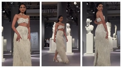 Sobhita Dhulipala stunned in Rimzim Dadu's outfit at India Couture Week. She wore a pristine, white ensemble. Her ensemble featured a side slit maxi skirt had tussles, an off-shoulder bralette. She finished her look with matching heels and a choker necklace. (Instagram/@fdciofficial) Sobhita Dhulipala stunned in Rimzim Dadu's outfit at India Couture Week. She wore a pristine, white ensemble. Her ensemble featured a side slit maxi skirt had tussles, an off-shoulder bralette. She finished her look with matching heels and a choker necklace. (Instagram/@fdciofficial)