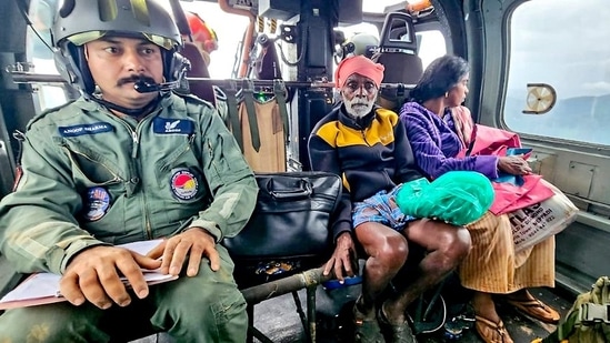 The Indian Army personnel rescue stranded people and carry them to safer places on helicopters during a search and rescue operation following a devastating landslide that hit hilly villages triggered by heavy rainfall. (ANI Photo) (PRO Defence Trivandrum-X)