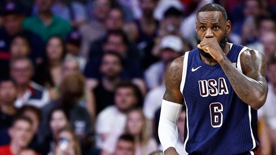 USA's LeBron James reacts in the men's preliminary round group C basketball match between Serbia and USA during the Paris 2024 Olympic Games at the Pierre-Mauroy stadium in Villeneuve-d'Ascq, northern France, on July 28, 2024. (AFP / Sameer Al-Doumy)