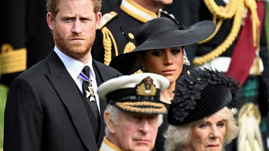 FILE PHOTO: Britain's Meghan, Duchess of Sussex, cries as she, Prince Harry, Duke of Sussex, Queen Camilla and King Charles attend the state funeral and burial of Britain's Queen Elizabeth, in London, Britain, September 19, 2022. (REUTERS / Toby Melville)