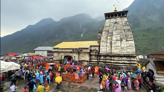 Devotees at the Kedarnath temple in Rudraprayag district of Uttarakhand. (PTI Photo)