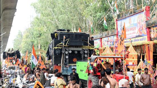 Huge drums, speakers and with DJ sets were seen in the Kanwar Yatra at Nandgram on Delhi-Meerut Road, in Ghaziabad, on Wednesday. (Sakib Ali/HT Photo)