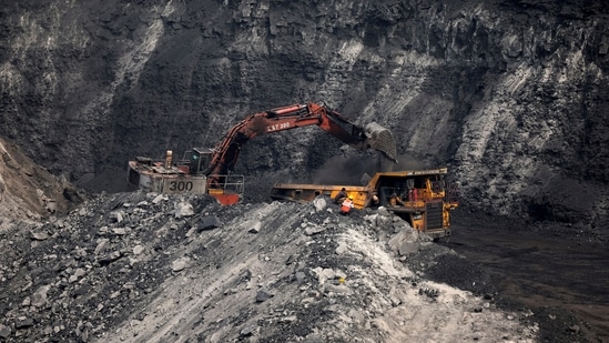 A loader loads coal in the truck at an open cast coal field at Topa coal mine in the Ramgarh district in the eastern Indian state of Jharkhand, India, February 27, 2024. (Amit Dave/Reuters)