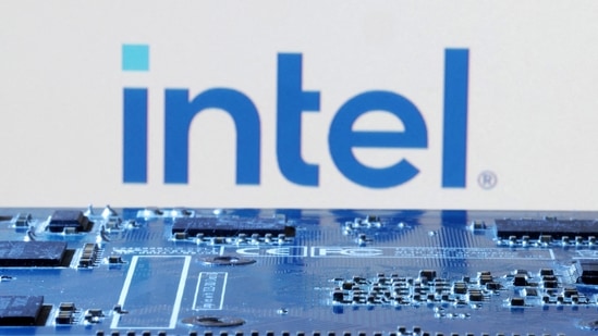 Intel layoffs: Intel logo is seen near computer motherboard.(Reuters)