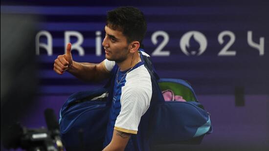 Lakshya Sen gestures as he leaves the court after winning the Group L match against Jonatan Christie of Indonesia. (REUTERS)