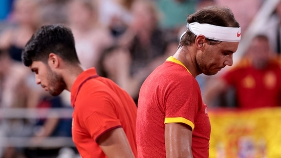 Rafael Nadal and Carlos Alcaraz were dumped out of the Olympics men's doubles (REUTERS)