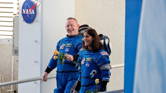 FILE PHOTO: NASA astronauts Butch Wilmore and Sunita Williams walk at NASA's Kennedy Space Center, ahead of Boeing's Starliner-1 Crew Flight Test (CFT) mission on a United Launch Alliance Atlas V rocket to the International Space Station, in Cape Canaveral, Florida, U.S., June 5, 2024. (REUTERS / Joe Skipper)