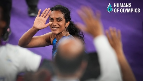 India's PV Sindhu acknowledges fans as she leaves after her women's singles group play stage badminton match against Estonia's Kristin Kuuba