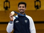 Swapnil Kusale's sensational bronze medal win early on Day 6 in 50m rifle 3 positions men's shooting final remained the highlight for India on what was otherwise a grim day for the country's prospects. While Kusale added an unprecedented third medal from the shooting range, star contenders such as PV Sindhu, Nikhat Zareen, Sift Kaur Samra and badminton doubles pair Satwiksairaj Rankireddy and Chirag Shetty all big farewell without being able to fight for a medal.(AP)