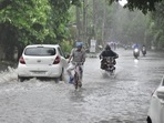 Commuters making their way through heavy rain . Amritsar, India, on Thursday, August 1, 2024. (Sameer Sehgal/Hindustan Times)