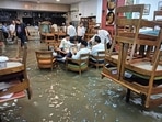 In Delhi's flooded Press Club, it was business as usual.
