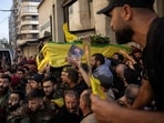 Members of Hezbollah carry the coffin of Fuad Shukr, a senior Hezbollah commander who was killed by an Israeli strike on Tuesday, during his funeral in Beirut's southern suburbs, Lebanon August 1, 2024. REUTERS
