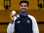 India's Swapnil Kusale celebrates after winning the bronze medal in the 50m rifle 3 positions men's final at the 2024 Summer Olympics, Thursday, Aug. 1, 2024, in Chateauroux, France. (AP Photo/Manish Swarup) India's Swapnil Kusale celebrates after winning the bronze medal in the 50m rifle 3 positions men's final at the 2024 Summer Olympics, Thursday, Aug. 1, 2024, in Chateauroux, France. (AP Photo/Manish Swarup)