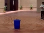 Water dripping from the ceiling of the new Parliament building being collected in a bucket. (Photo from X) Water dripping from the ceiling of the new Parliament building being collected in a bucket. (Photo from X)
