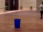 Water dripping from the ceiling of the new Parliament building being collected in a bucket. (Photo from X) Water dripping from the ceiling of the new Parliament building being collected in a bucket. (Photo from X)