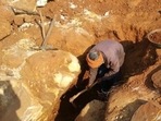 A labourer digs a shallow diamond mine in Panna (Representational image)(HT Archive) A labourer digs a shallow diamond mine in Panna (Representational image)(HT Archive)