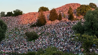 Taylor wrote in her photo dump from Munich, “What a magical experience it was playing in Munich… The crowds of 74,000 people a night in the stadium were so passionate, and so generous to us. And I had no idea before I got to Munich that there’s a huge park behind the stadium, but around 50,000 people came out and listened to the show from the hillside both nights. I’ve been watching so many videos of the crowds out there fully participating in the show from afar, all that joy… I’m feeling really grateful for the unexpected memories this tour has created.” 