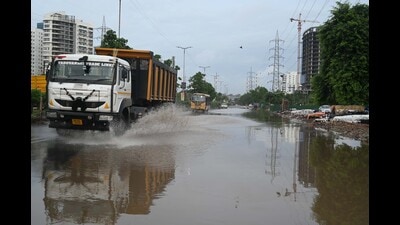 A waterlogged road in Sector 66 of Gurugram on Thursday. (Parveen Kumar/HT)