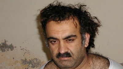 FILE- Khalid Sheikh Mohammed, the alleged Sept. 11 mastermind, is seen shortly after his capture during a raid in Pakistan Saturday March 1, 2003 in this photo obtained by the Associated Press. The man accused of being the main plotter in al-Qaeda's Sept. 11, 2001 attacks has agreed to plead guilty, The Defense Department said Wednesday. AP/PTI(AP08_01_2024_000053A) (ASSOCIATED PRESS) FILE- Khalid Sheikh Mohammed, the alleged Sept. 11 mastermind, is seen shortly after his capture during a raid in Pakistan Saturday March 1, 2003 in this photo obtained by the Associated Press. The man accused of being the main plotter in al-Qaeda's Sept. 11, 2001 attacks has agreed to plead guilty, The Defense Department said Wednesday. AP/PTI(AP08_01_2024_000053A) (ASSOCIATED PRESS)